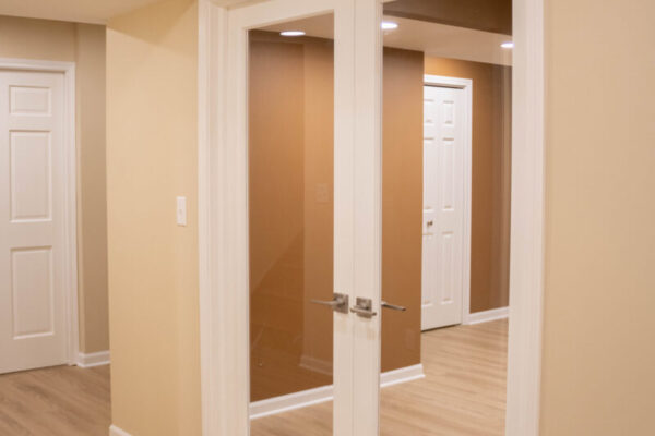 french doors to gym in finished basement